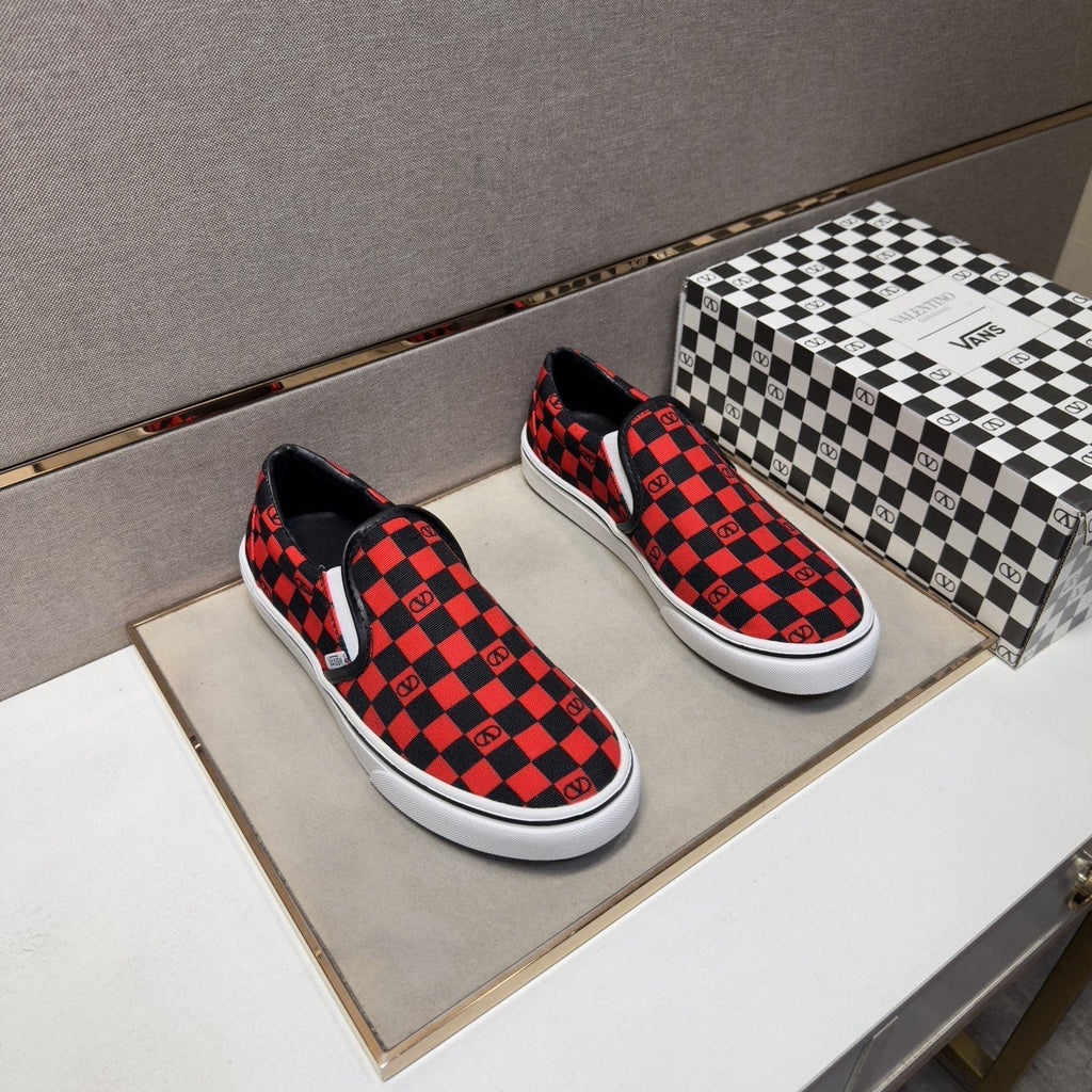 Vans Red and Black Checkerboard Slip-On Sneakers