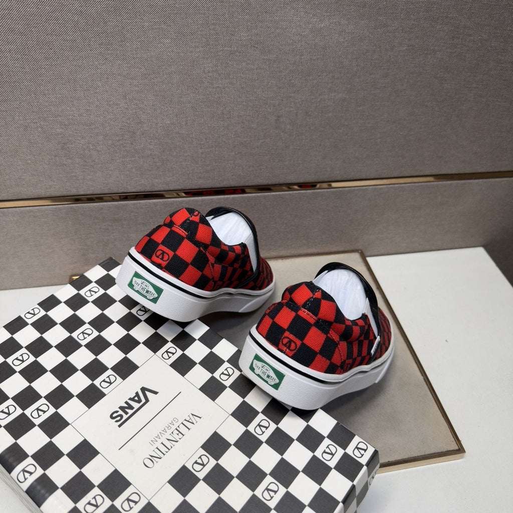 Vans Red and Black Checkerboard Slip-On Sneakers