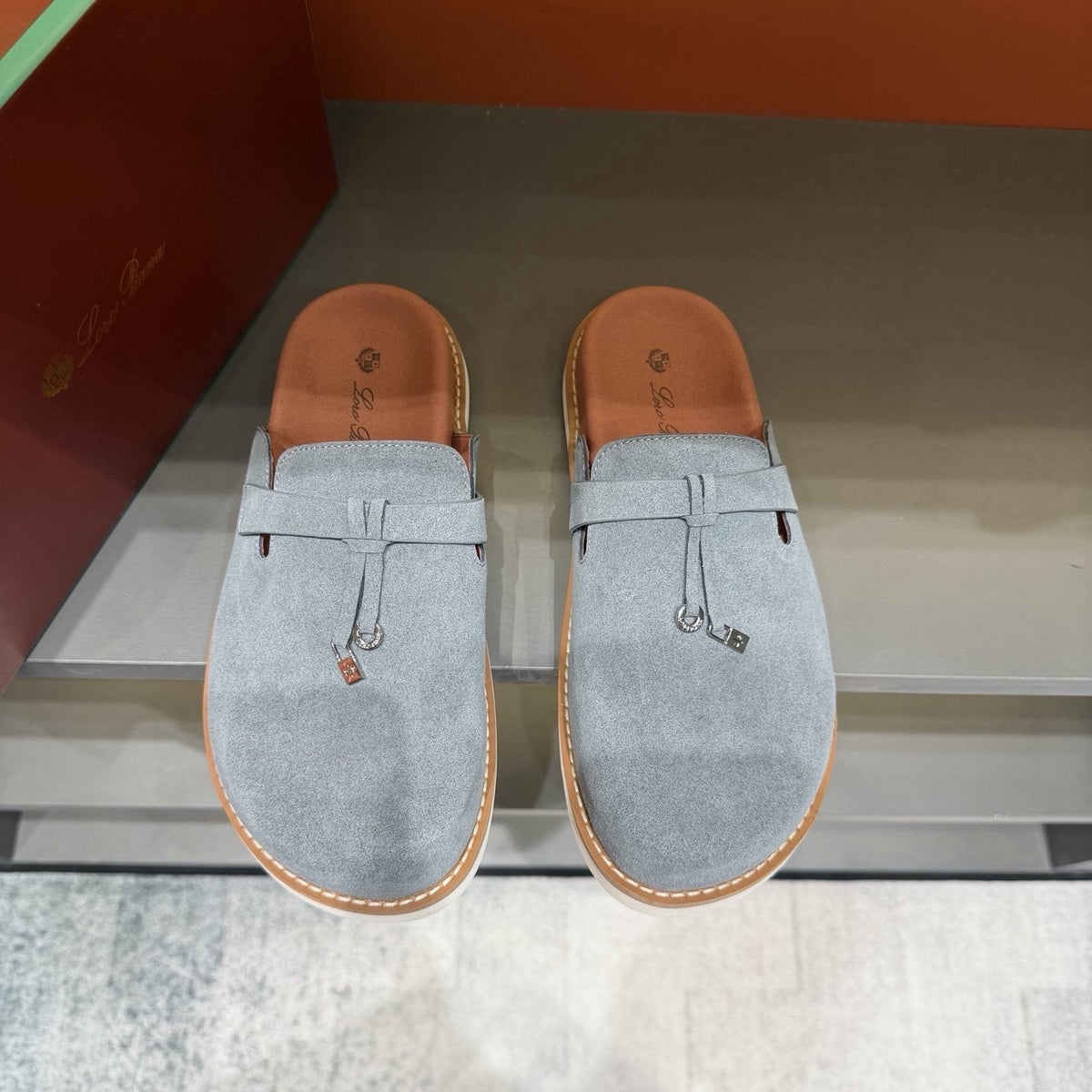 Backless Loafer Mules with Metal Ornament